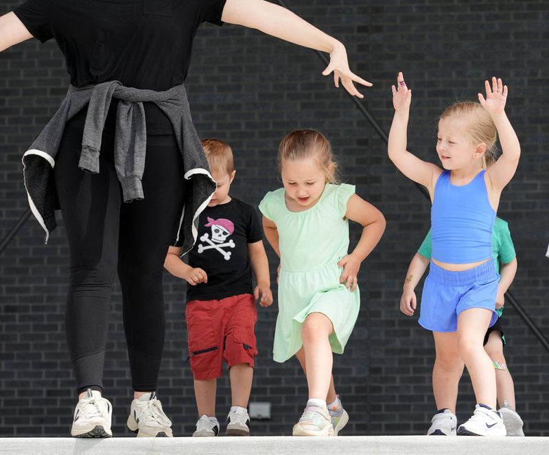 Revival Dance Complex leads a free community dance class June 21 at the Plain Township Amphitheater.