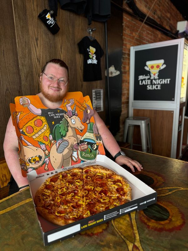 Mikey's Late Night Slice has launched an interactive, full-color pizza-box bib.