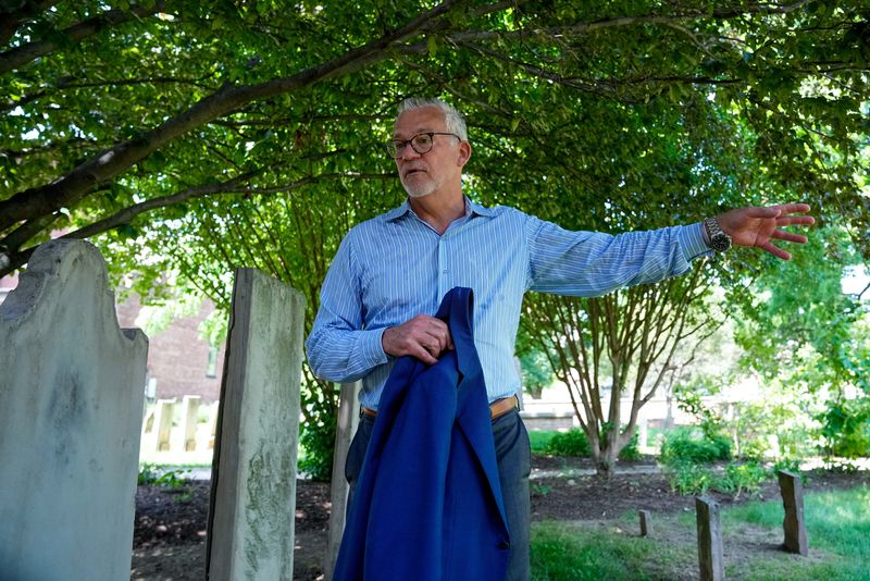 Doug Preisse speaks about the online portal and the mobile app called, Survey123 at the St. John's Episcopal Church and Cemetery in Worthington.