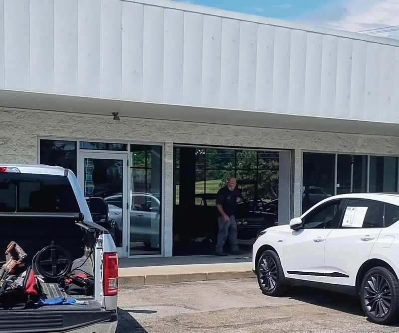 Cleanup work was ongoing around 11 a.m. June 27 at a Jeff's Motorcars showroom, 5732 Dressler Road NW, hours after multiple vehicles were stolen and driven off the lot.