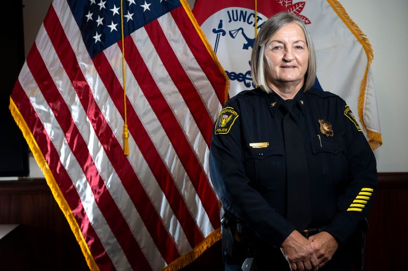 Cincinnati police chief Teresa A. Theetge stands next to the American Flag at District 1 in West End on Friday, June 27, 2025.