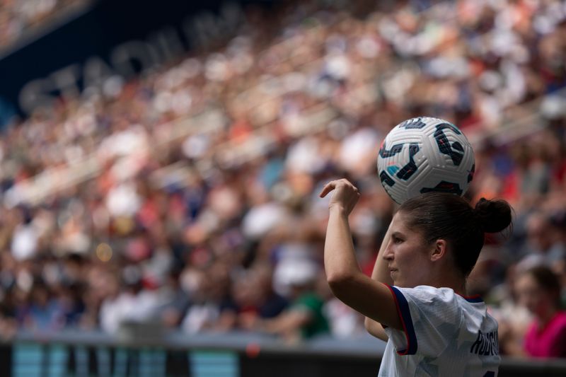 United States defender Izzy Rodriguez (11) looks to throw the ball in during the first half of the soccer match between the United States and Ireland at TQL Stadium in Cincinnati on Sunday June 29, 2025.