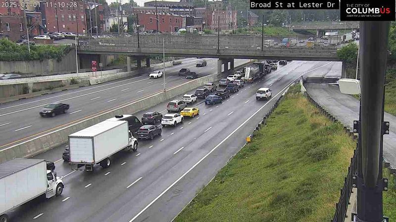 An Ohio Department of Transportation camera shows traffic stalled on Interstate 71 in downtown Columbus near Broad and Lester Streets after a crash involving a semi-truck and a dump truck.