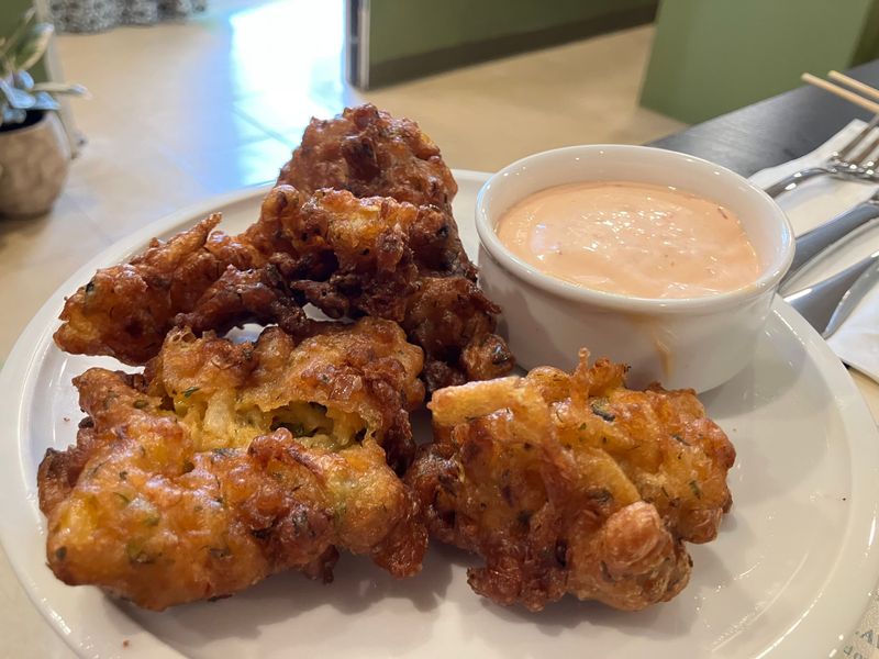 Lyla's Family Restaurant now serves corn and zucchini fritters served with herb aioli.