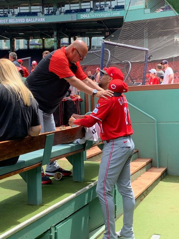 Hunter Greene, getting encouragement from manager Terry Francona before his simulated inning in Boston, threw a bullpen session Saturday, July 5 before the Reds-Phillies game. If he comes out of that healthy, he'll start a rehab stint at Louisville Tuesday.