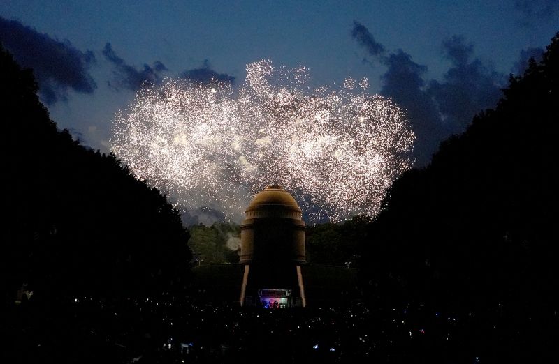 Fireworks are seen over the McKinley National Monument during the 2025 Monumental Fireworks celebration on the grounds of McKinley Presidential Library & Museum in Canton.
