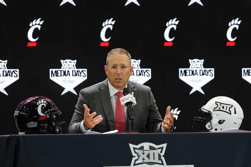 Cincinnati head coach Scott Satterfield addresses the media during 2025 Big 12 Football Media Days at The Star July 8. Big 12 media members "unofficially" picked UC to finish 11th out of 16 teams.