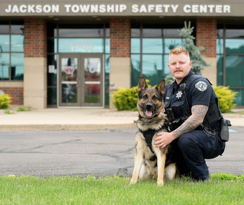 Kyle Myers serves as a K-9 patrol officer with the Jackson Township Police Department. He's shown with his K-9 partner Maverick.