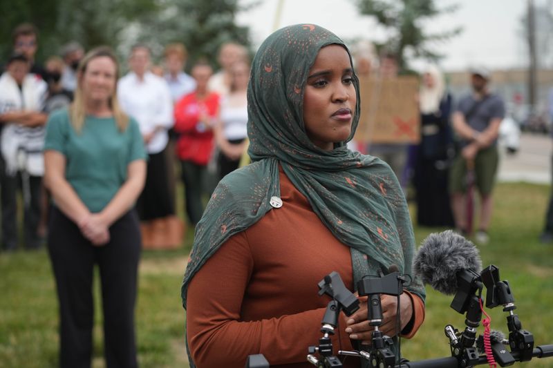 Local lawmakers and faith leaders gather outside of the Blue Ash Homeland Security and Immigration and Customs Enforcement office after a former Cincinnati Children's hospital chaplain was detained by ICE on July 9, they said Ohio House Rep. Munira Abdullahi, a Columbus Democrat, speaks at the press conference.