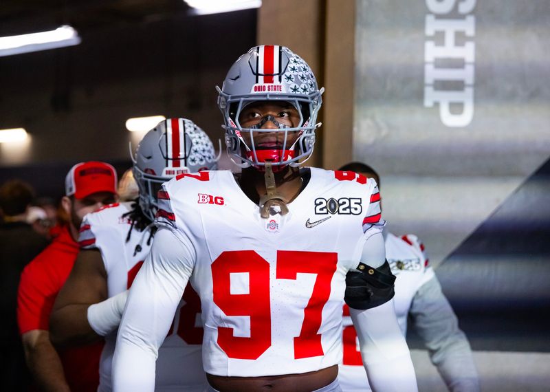 Jan 20, 2025; Atlanta, GA, USA; Ohio State Buckeyes defensive end Kenyatta Jackson Jr. (97) against the Notre Dame Fighting Irish during the CFP National Championship college football game at Mercedes-Benz Stadium. Mandatory Credit: Mark J. Rebilas-Imagn Images