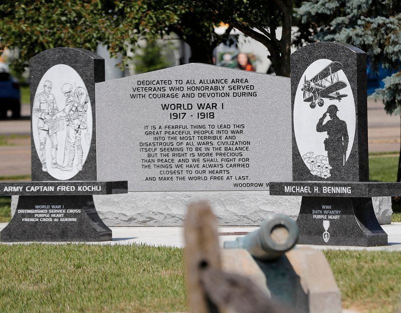 The new World War I memorial at Memorial Park in Alliance pays tribute to all who served in the conflict, and spotlights the service of US Army Capt. Fred Kochli, left, who received the distinguished service cross and a Purple Heart for his service. Also shown is a tribute to Michael H. Benning, who served in the 314th Infantry during World War II, and received a Purple Heart. The memorials were dedicated Saturday, July 12, 2025, during a ceremony at the park on East State Street in Alliance.