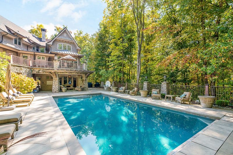 A recently listed Delaware County home includes a 20-by-40-foot pool with a custom pebble floor.