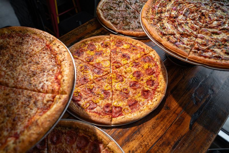 Mikey's Late Night slice sells whole pizzas as well as individual slices at its University District location on North Pearl Street.