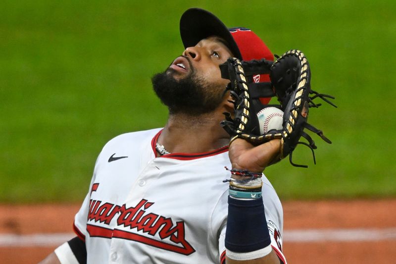 Jul 19, 2025; Cleveland, Ohio, USA; Cleveland Guardians first baseman Carlos Santana (41) catches a foul ball in the fourth inning against the Athletics at Progressive Field. Mandatory Credit: David Richard-Imagn Images