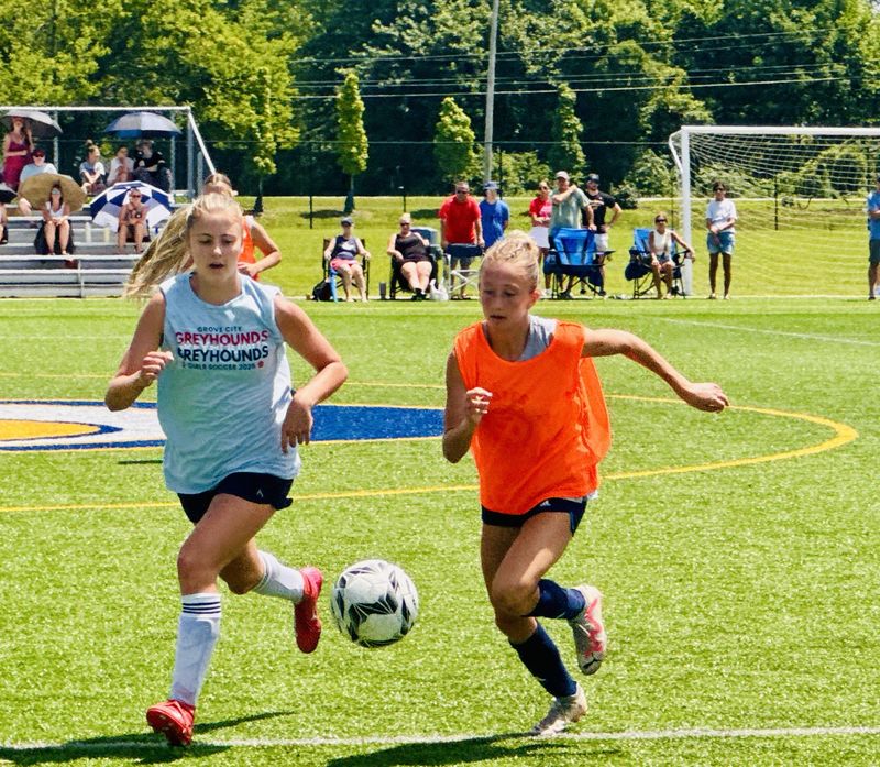 Lancaster sophomore Brooke Darringer moves the ball up the field against Grove City during the Columbus Soccer Summer Showcase on July 19, 2025, at Gahanna.