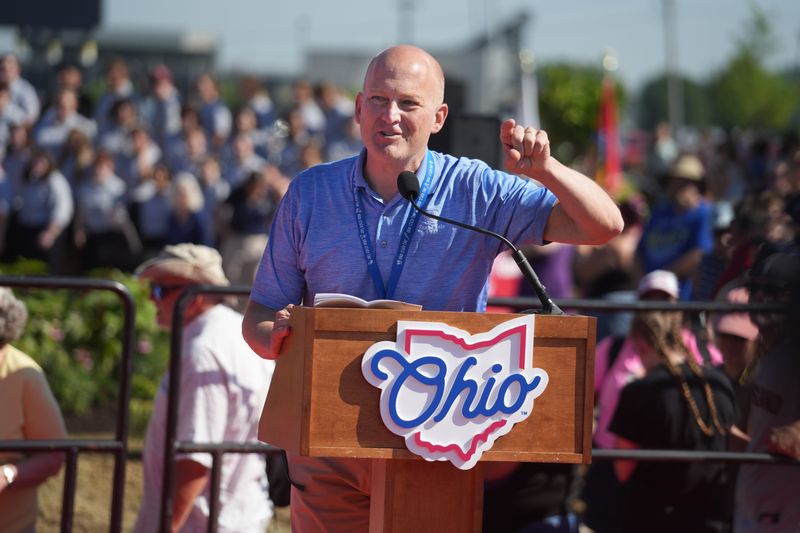 Adam Heffron, Ohio Expo Center & State Fairgrounds Executive Director, speaks as Ohio Gov. Mike DeWine opens the Ohio State Fair at the redesigned Cardinal Gate entrance July 23, 2025.