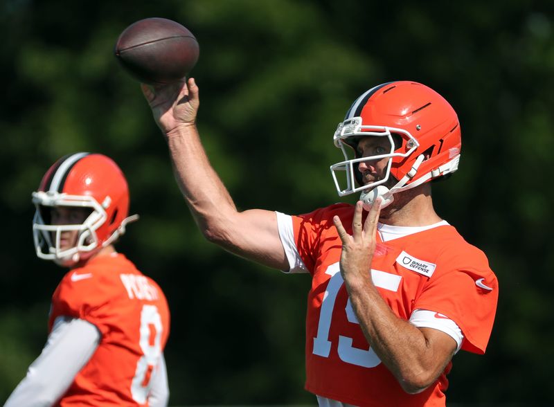 Cleveland Browns quarterback Joe Flacco (15) throws as quarterback Kenny Pickett (8) looks on during NFL training camp practice at the Cleveland Browns training facility, Wednesday, July 23, 2025, in Berea, Ohio.