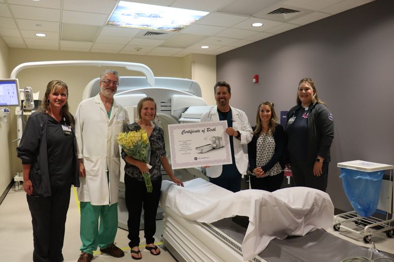Aultman Alliance Community Hospital honored patient Brenda Jewell by naming the hospital's new imaging equipment after her. On hand for the dedication were, from left, nuclear medicine tech Susan A. Angiuli; radiologist Dr. Frederick Meoli; Brenda Jewell; nuclear medicine lead tech Dominic A. Dalesandro; Aly R. Sacco; and nuclear medicine tech Rachele L. Cresanto.