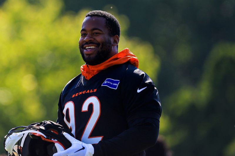 Jul 23, 2025; Cincinnati, OH, USA; Cincinnati Bengals defensive tackle B.J. Hill (92) walks on the field during training camp at Kettering Health Practice Field. Mandatory Credit: Katie Stratman-Imagn Images