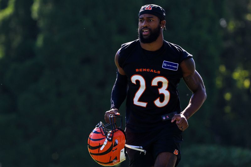 Jul 23, 2025; Cincinnati, OH, USA; Cincinnati Bengals cornerback Dax Hill (23) walks on the field during training camp at Kettering Health Practice Field. Mandatory Credit: Katie Stratman-Imagn Images