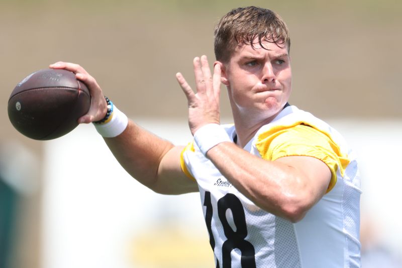 Jul 24, 2025; Latrobe, PA, USA; Pittsburgh Steelers quarterback Will Howard (18) participates in drills during training camp at Saint Vincent College. Mandatory Credit: Charles LeClaire-Imagn Images