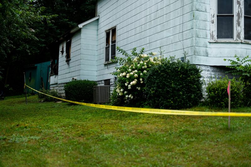 Caution tape can still be seen around a residence on July 28, 2025, one day after a fire extensively damaged 302 E. High St., Uhrichsville.