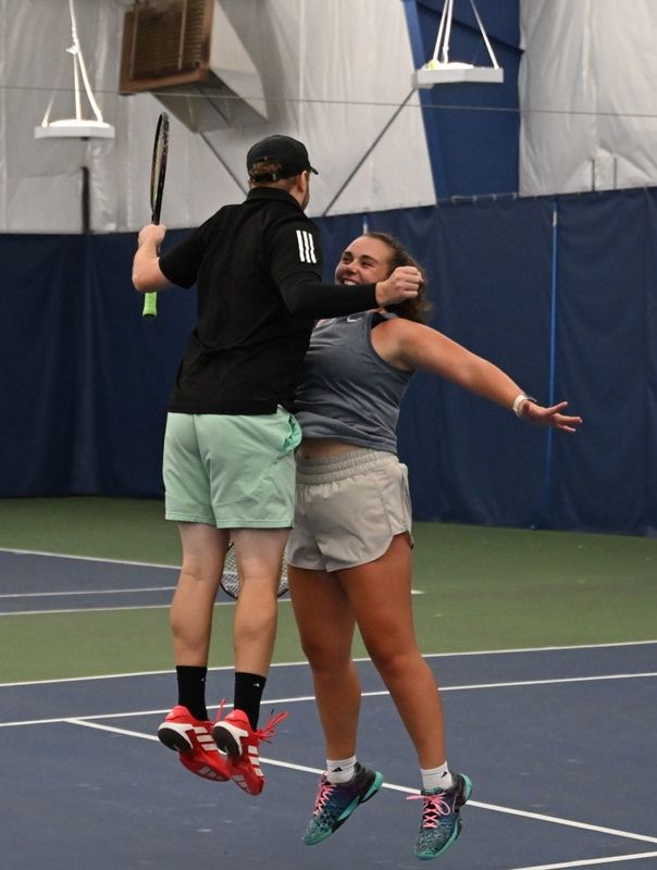 Jansen Webster and Hayliegh Tucker celebrate after a point en route to winning mixed doubles in the 92nd News Journal Tennis Tournament.