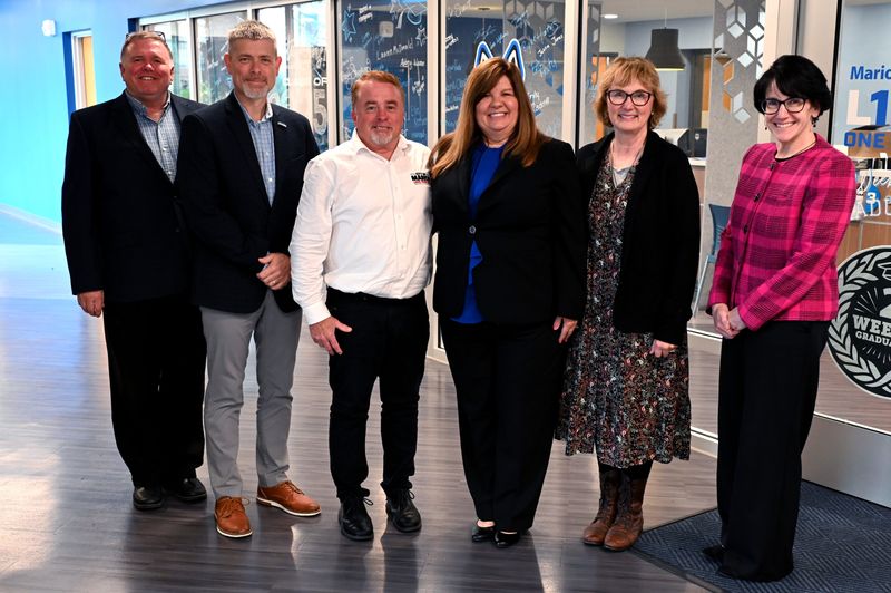 Mike Stuckey, left, Dr. Ryan McCall, Rob Cowell, Tammi Cowell, Ellen Messenger and Dr. Amy Adams were on hand when the announcement of the Crowell scholarship at Marion Technical College was announced.