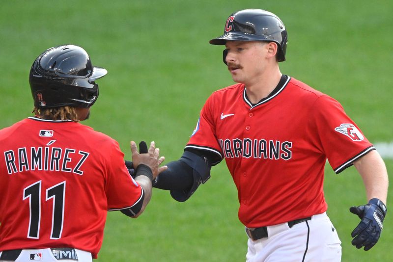 Jul 29, 2025; Cleveland, Ohio, USA; Cleveland Guardians first baseman Kyle Manzardo (9) celebrates his two-run home run with third baseman Jose Ramirez (11) in the third inning against the Colorado Rockies at Progressive Field. Mandatory Credit: David Richard-Imagn Images