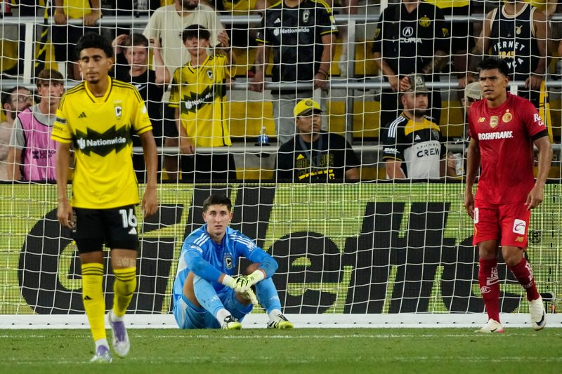 Columbus Crew goalkeeper Patrick Schulte (28) reacts to a goal by Toluca FC forward Paulinho (26) during the second half of the Leagues Cup match against the Columbus Crew at Lower.com Field in Columbus on July 29, 2025. The Crew lost 4-2 in penalty kicks after a 2-2 draw in regulation.