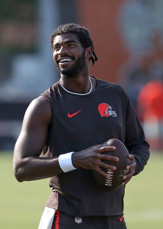 Cleveland Browns quarterback Shedeur Sanders (12) is all smiles during NFL training camp at CrossCountry Mortgage Campus, Wednesday, July 30, 2025, in Berea, Ohio.