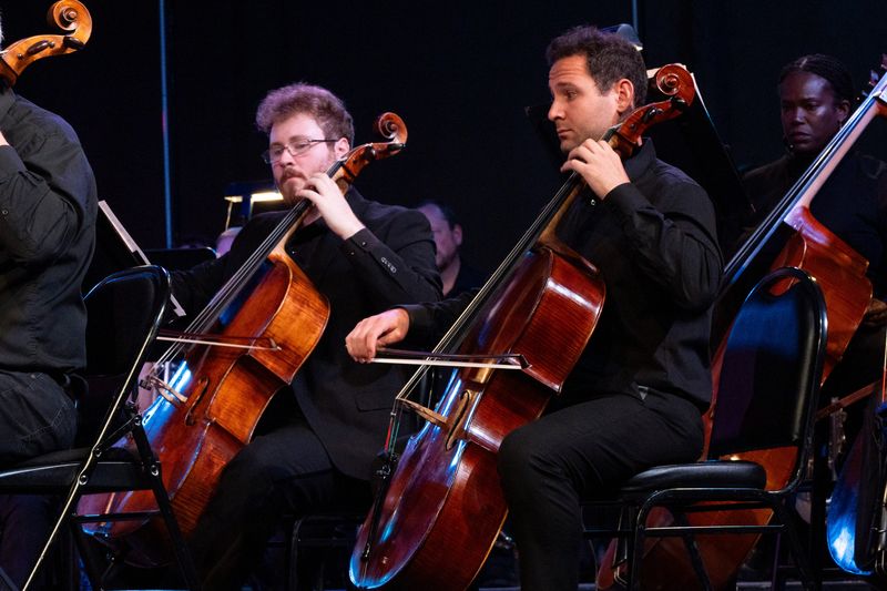 The Lancaster Festival Orchestra, directed by Maestro John Devlin, plays for the crowd during the final concert of the Lancaster Festival at the Fairfield Christian Church on August 2, 2025, in Lancaster, Ohio.