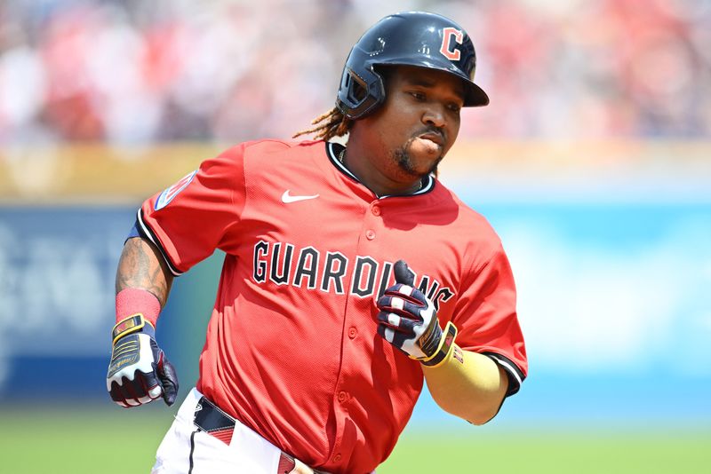 Guardians third baseman Jose Ramirez rounds the bases after hitting a home run against the Twins on Aug. 3.