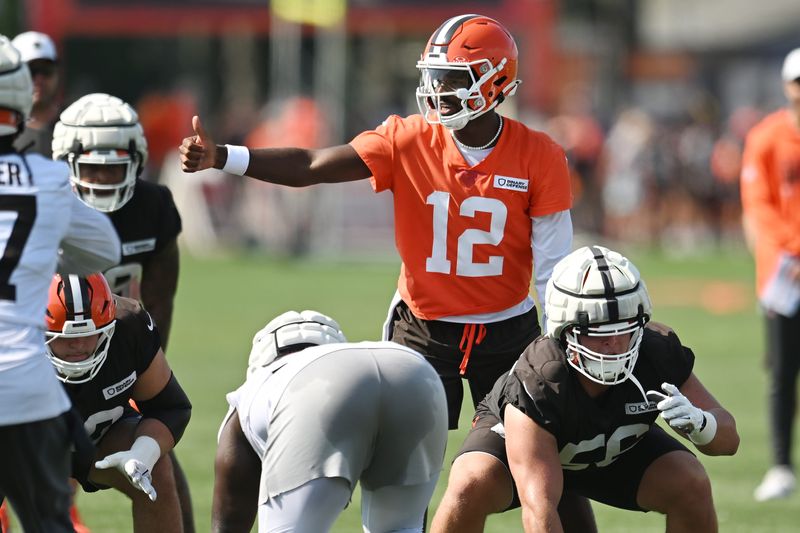 Jul 26, 2025; Berea, OH, USA; Cleveland Browns quarterback Shedeur Sanders (12) runs the offense during training camp at CrossCountry Mortgage Campus. Mandatory Credit: Ken Blaze-Imagn Images