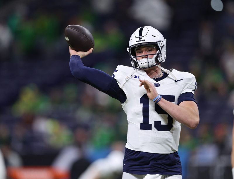 Dec 7, 2024; Indianapolis, IN, USA; Penn State Nittany Lions quarterback Drew Allar (15) warms up before a game against the Oregon Ducks in the 2024 Big Ten Championship game at Lucas Oil Stadium. Mandatory Credit: Jordan Prather-Imagn Images