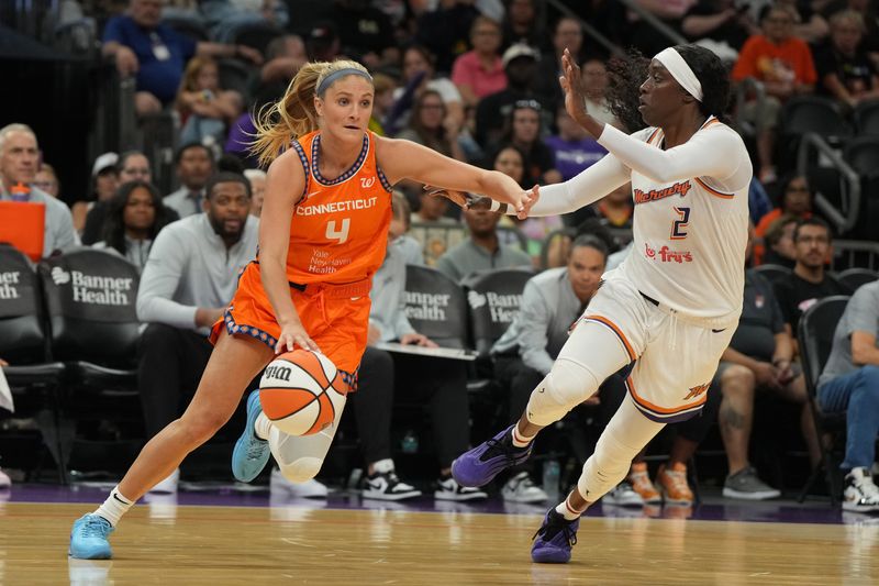 Jacy Sheldon drives to the basket for the Connecticut Sun on Aug. 5.