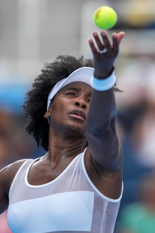 0009 serves during the first round match between Venus Williams (USA) and Jessica Bouzas Maneiro (ESP) in the Cincinnati Open at the Lindner Family Tennis Center in Mason, Ohio, on Thursday, Aug. 7, 2025. Bouzas Maneiro won in straight sets, 6-4, 6-4.
