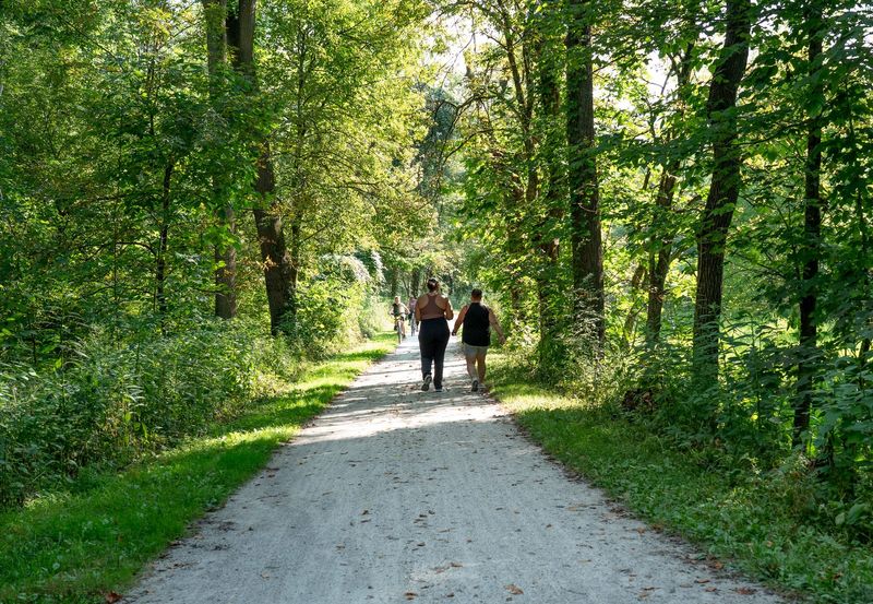 Brittni Lawrence and Stephanie Rohr head out on a hike through Cuyahoga Valley National Park’s Ira Trailhead in Peninsula on August 7.