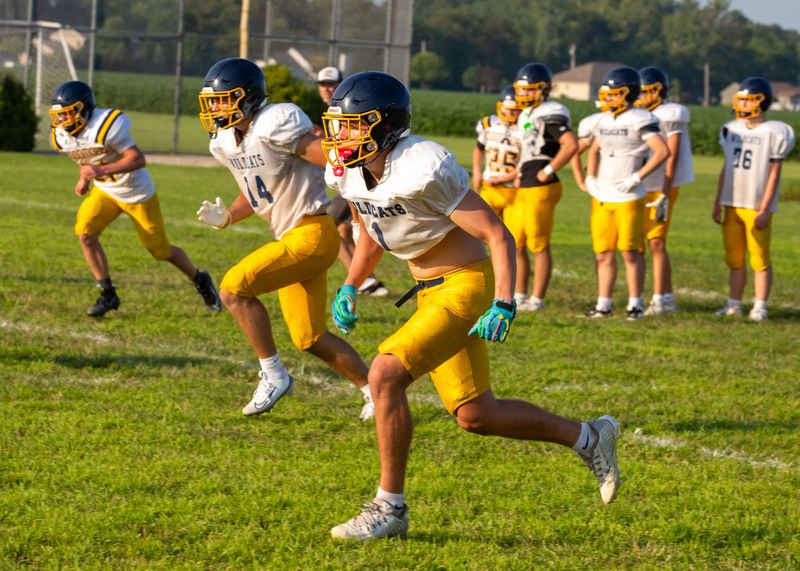 Woodmore's Ethan Greer, left, and Wesley Kayser pursue the ball.
