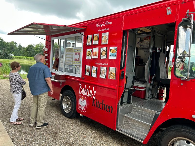 Customers check out the Babcia's Kitchen food truck at the Das Weinhaus winery in Litchfield.