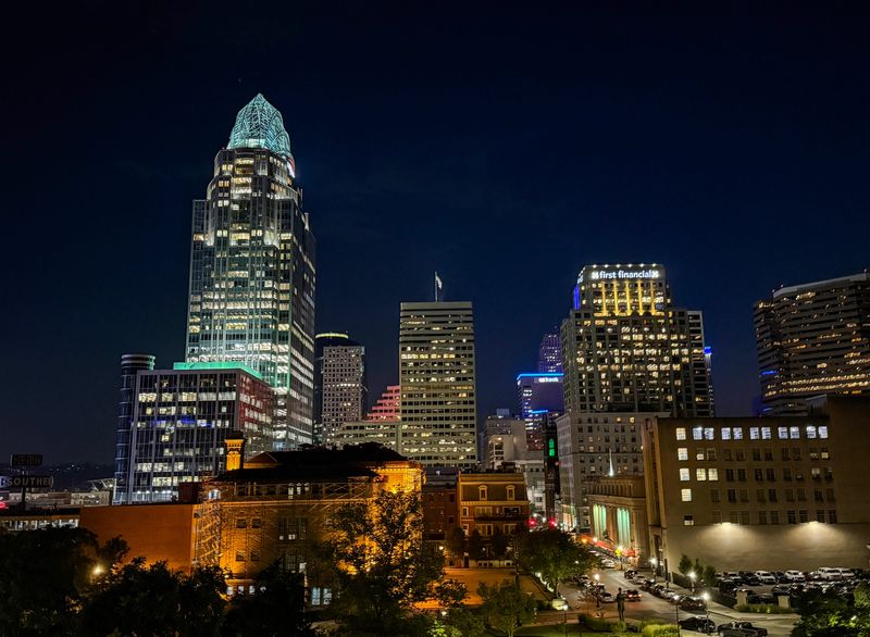 A view of the downtown Cincinnati skyline, including the Great American Tower at Queen City Square, as seen from the rooftop bar at the Lytle Park Hotel in August, 2025. Private companies play a pivotal role in Cincinnati's economy and community, as seen in the Deloitte 100 list. The Enquirer/Cara Owsley