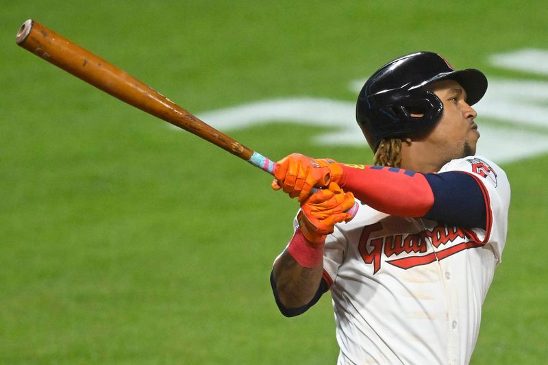 Cleveland Guardians' Jose Ramirez hits a solo home run in the eighth inning against the Miami Marlins on Aug. 12, 2025, in Cleveland.