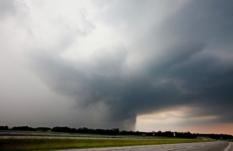 A heavy storms moves towards St. Rte. 23 north of Marion Wednesday, June 12, 2013.