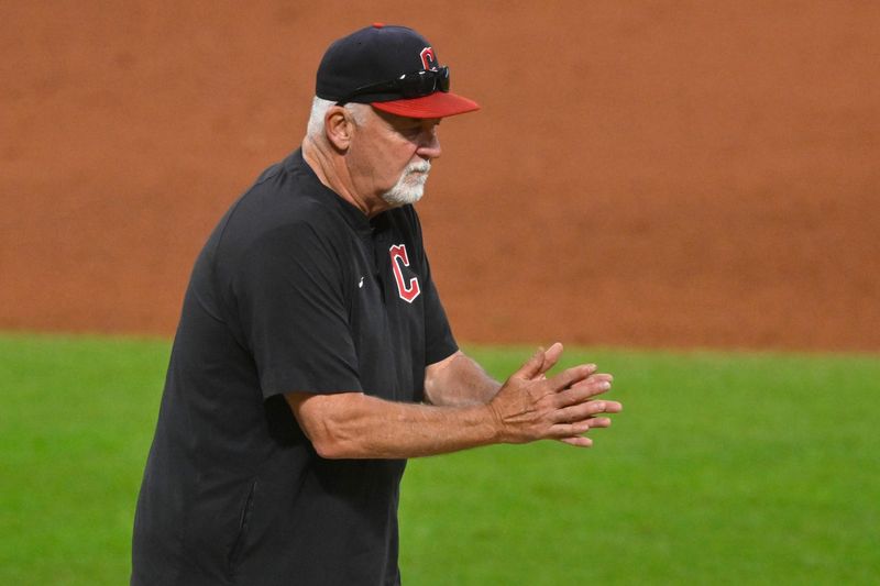 Aug 13, 2025; Cleveland, Ohio, USA; Cleveland Guardians pitching coach Carl Willis (51) walks to the mound in the sixth inning against the Miami Marlins at Progressive Field. Mandatory Credit: David Richard-Imagn Images