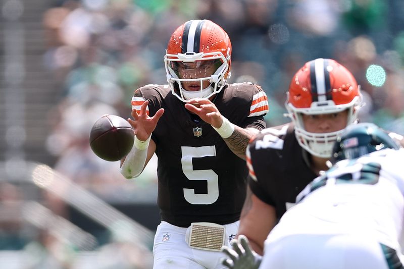 Aug 16, 2025; Philadelphia, Pennsylvania, USA; Cleveland Browns quarterback Dillon Gabriel (5) snaps the ball against the Philadelphia Eagles during the first quarter at Lincoln Financial Field. Mandatory Credit: Bill Streicher-Imagn Images