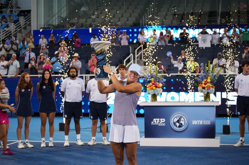 Iga Swiatek celebrates her victory after her Women's Singles Finals match against Jasmine Paolini at the Cincinnati Open in Mason, Ohio on Monday August 18, 2025. Swiatek beat Paolini 7-5, 6-4.