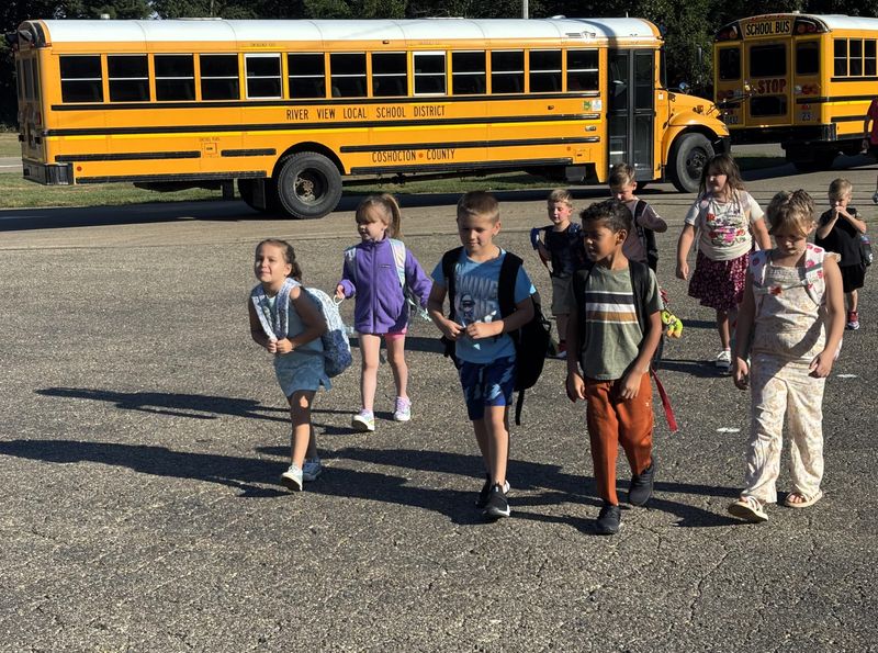 Several River View Elementary School students eagerly arrived for their first day of school on Aug. 19. The elementary school has a stagered start, with half of the students starting the new school year on Aug. 19 and the other half starting on Aug. 20.