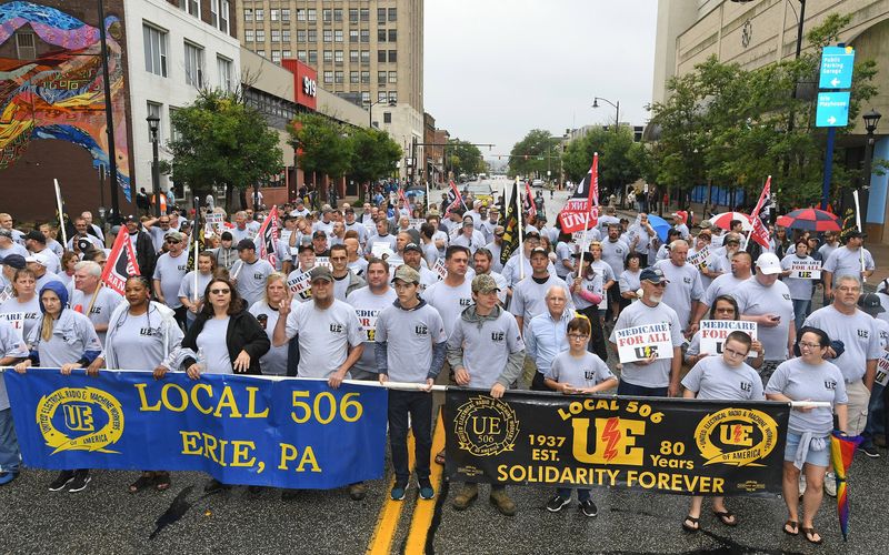 In this file photo from 2019, about 300 members and family related to UE Local 506 march north on State Street during a past Labor Day parade in downtown Erie. UE Local 506 represents most of the unionized workers at Wabtec Corp. in Lawrence Park Township.