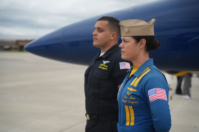 Blue Angels staff member Grant Causey of Jackson, Ohio and flight surgeon Jen Murr describe their jobs as The Blue Angels arrived Aug 21 as preparations continue for the 2025 Columbus Air Show to be held August 22-24, 2025 at Rickenbacker International Airport.