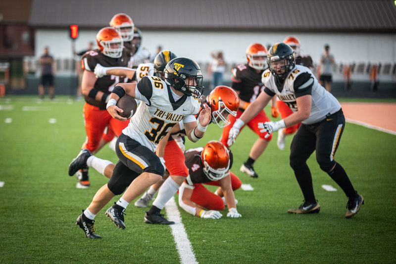 Tri-Valley's Leevi Wade (36) breaks for a big tun at a game between Meadowbrook and Tri-Valley high schools on Thursday, August 21st, 2025.